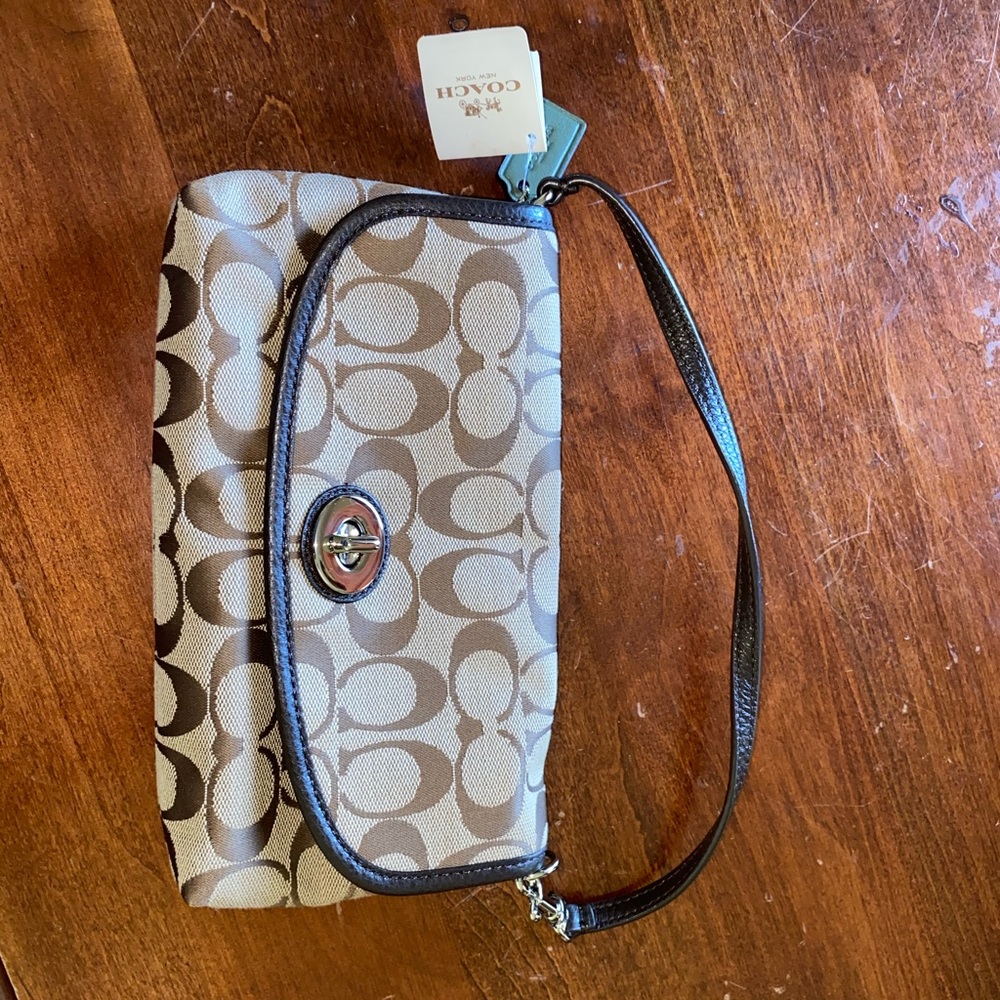 Brand new Coach clutch with tags!